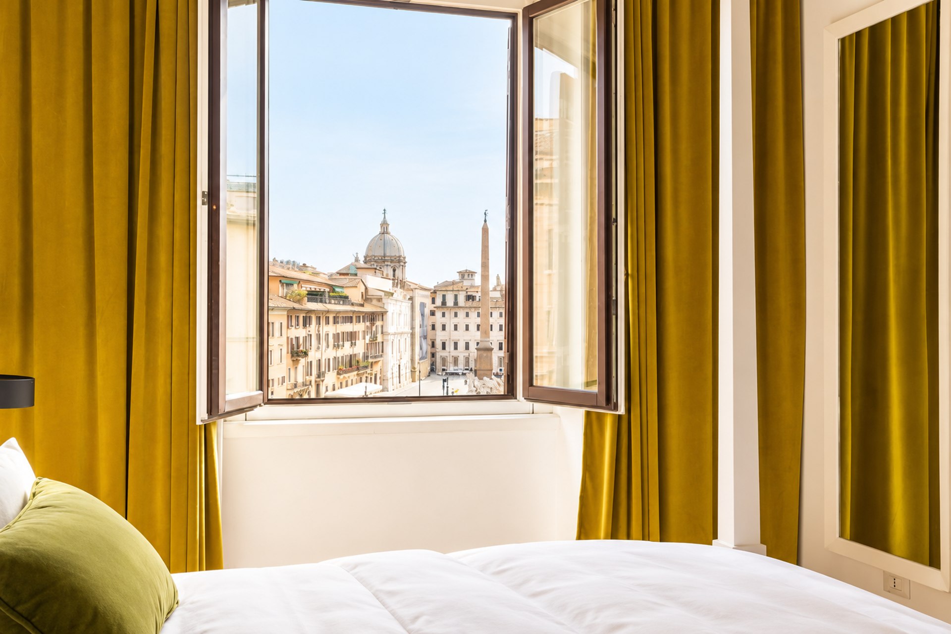 Deluxe Suite · window onto the square