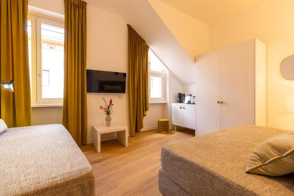 Deluxe Suite · second sleeping area